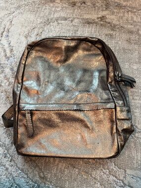 Handmade metallic leather backpack from Spain